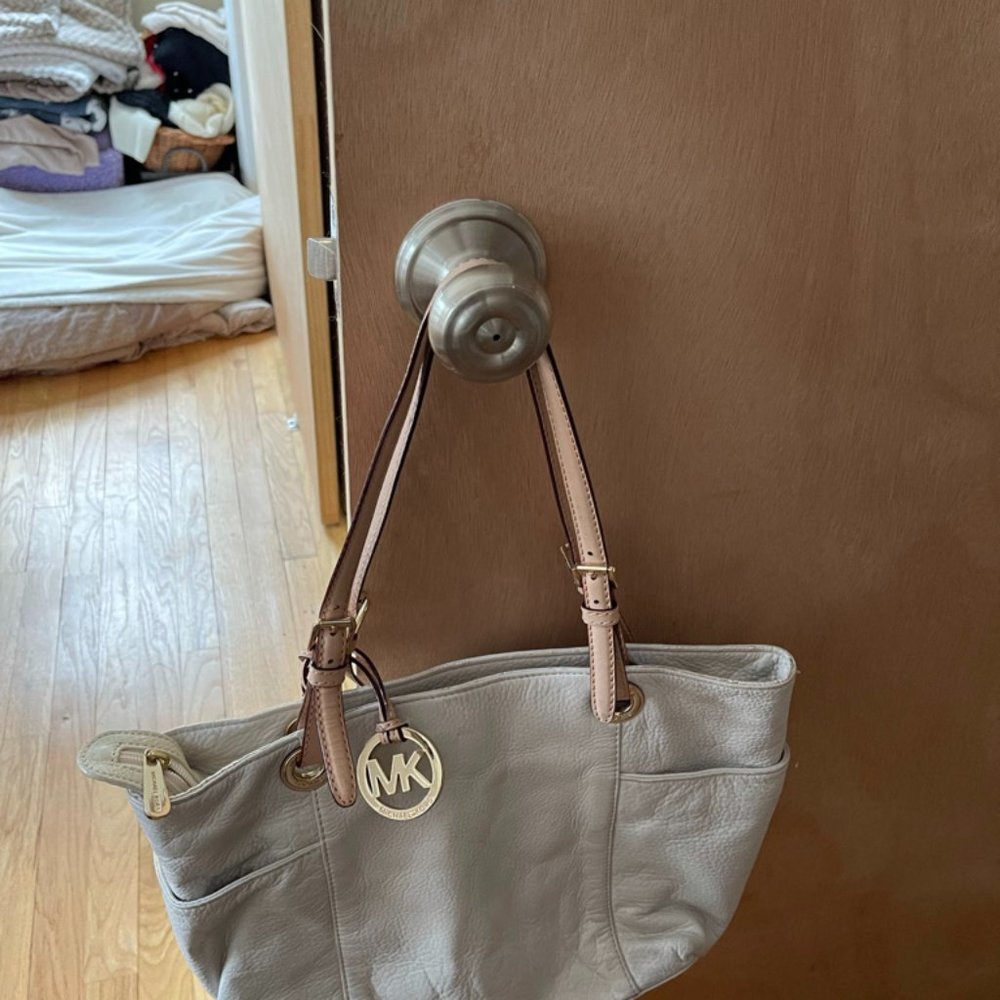 Michael Kors Tan and off white purse Medium size